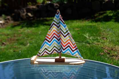 happy zigzag wooden sailboat